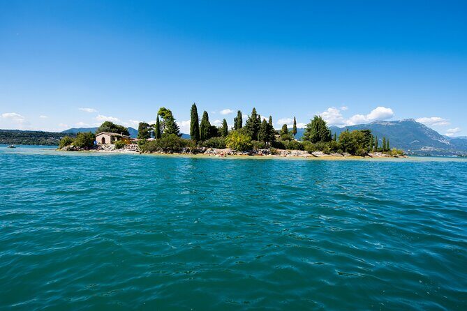 Boat Tour of the Islands of Lake Garda with Aperitif - Passing Gardone and San Marco Tower: classic framing from the water