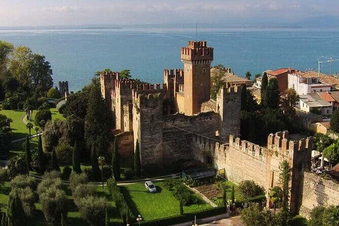Castles boat tour with Bardolino wine tasting and nibbles - Swim stop on Lake Garda: the best reason to pack a swimsuit