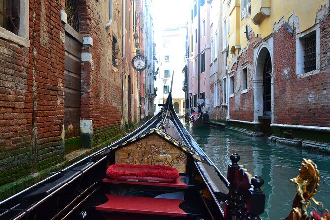 Charming Gondola Ride on the Grand Canal & Gondola Gallery™ - Shared gondola: the romance is real, the seating is the gamble