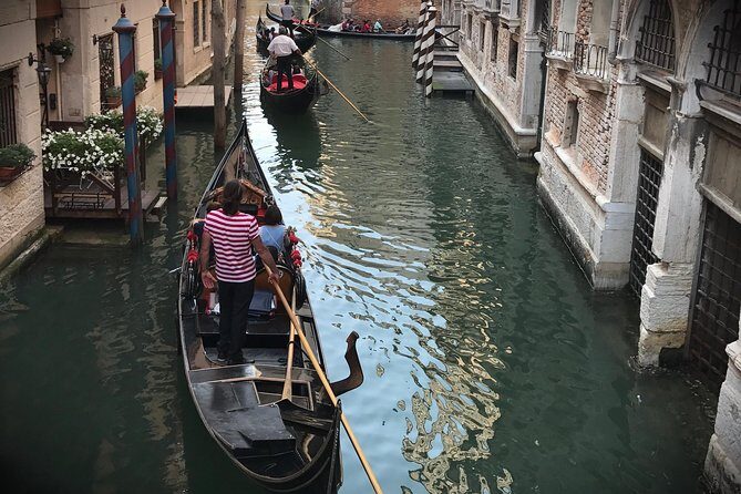 Charming Gondola Ride on the Grand Canal & Gondola Gallery™ - Madonna della Salute: the circular landmark that anchors the view