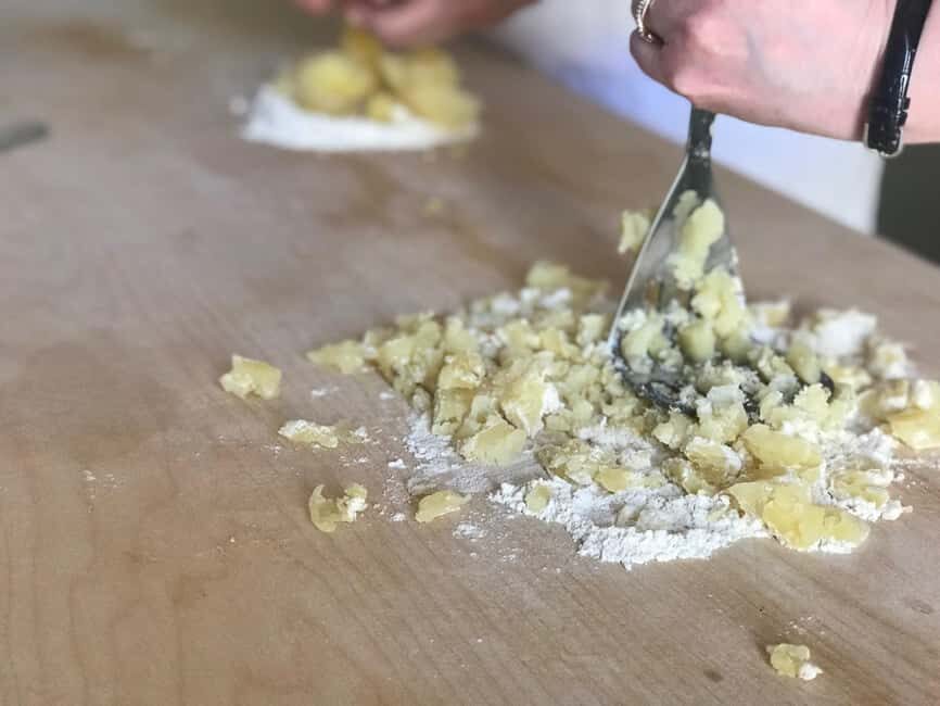 Discover the old market and make fresh pasta - From Flour to Dough: Learning Tortellini Nodo d’amore