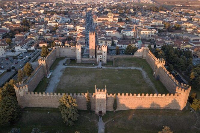 E-bike adventure among medieval castles and old villages - Pedal through vineyards and old-castle scenery toward the medieval village