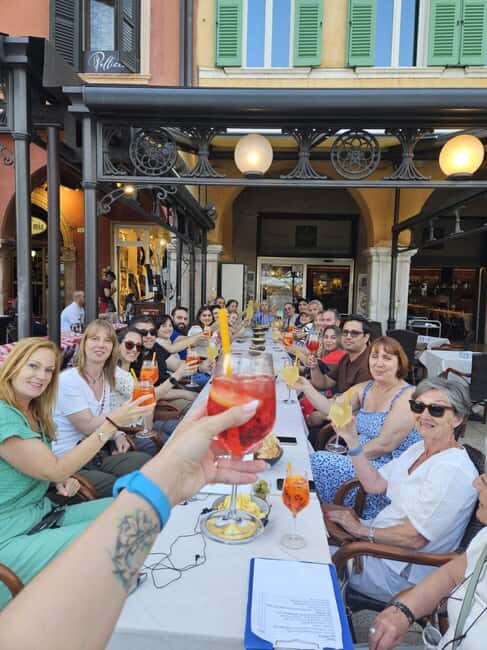 From Verona: Sirmione, Lake Garda with Boat & Spritz Tasting - Scaligero Castle and Catullus grotto sights, explained in plain terms
