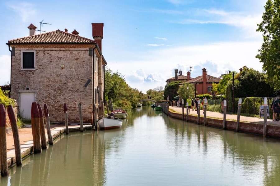 Full-day boat tour to Murano Burano Torcello from Chioggia - Burano: color, lace traditions, and an optional fish lunch at Al Raspo de Ua