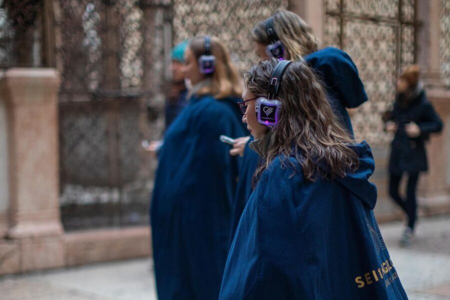 Guided Tour in the center of Verona accompanied by an Angel - Angel, Cloak, and Headphones: What Makes This Walk Different