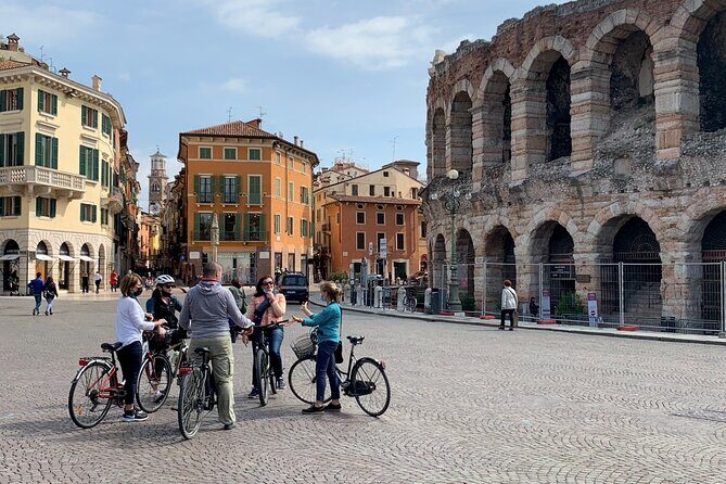 Highlights and hidden gems Verona Bike Tour - Piazza dei Signori and the medieval square vibe