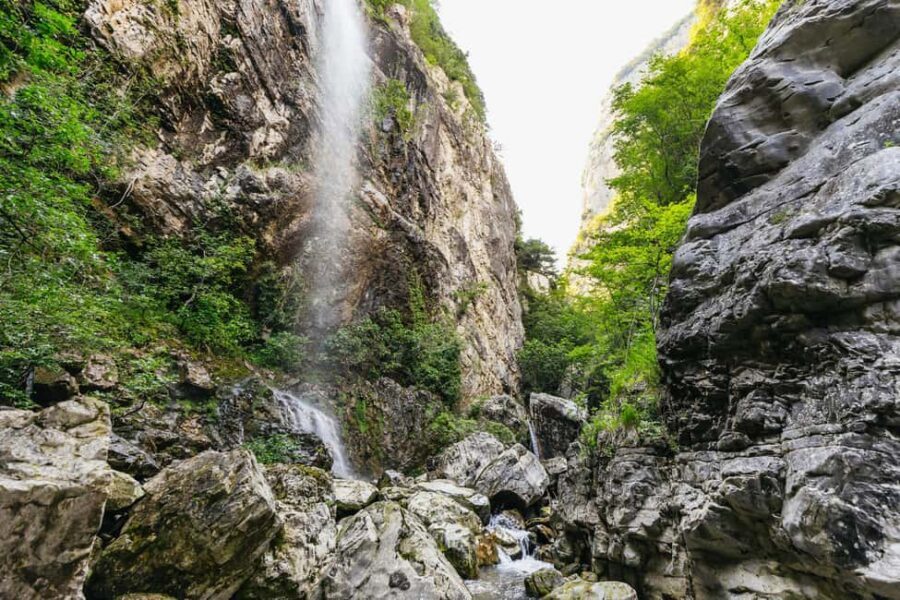 Lake Garda: Family Friendly Canyoning Tour - The Guided Canyon Section: Slides, Two Deep Pools, and Swim Breaks