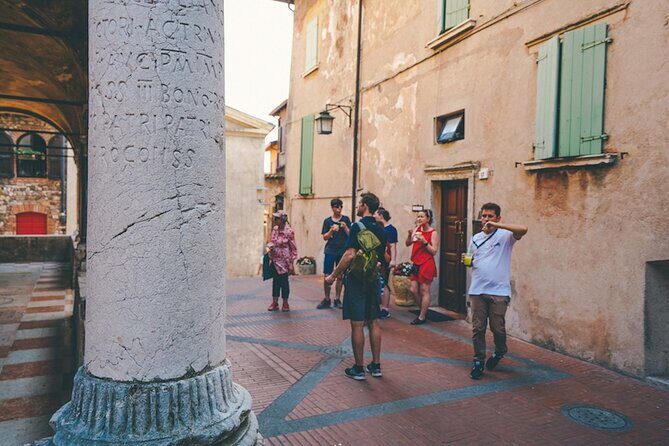 Lake Garda: Sirmione Boat Tour and Walking Tour - The Sirmione Walking Tour: Medieval Lanes, Callas, and a Fortress View