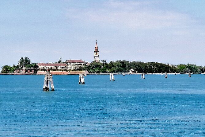 Lido Bike Tour: With a Local on the Island of Cinema - Faro di San Nicolò and the film festival edges you can actually see