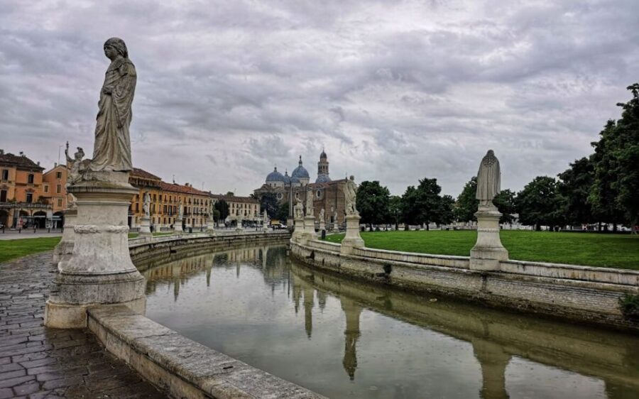 Padua: Highlights Private Walking Tour & Scrovegni Chapel - Piazza delle Erbe and the covered market under Gothic arches