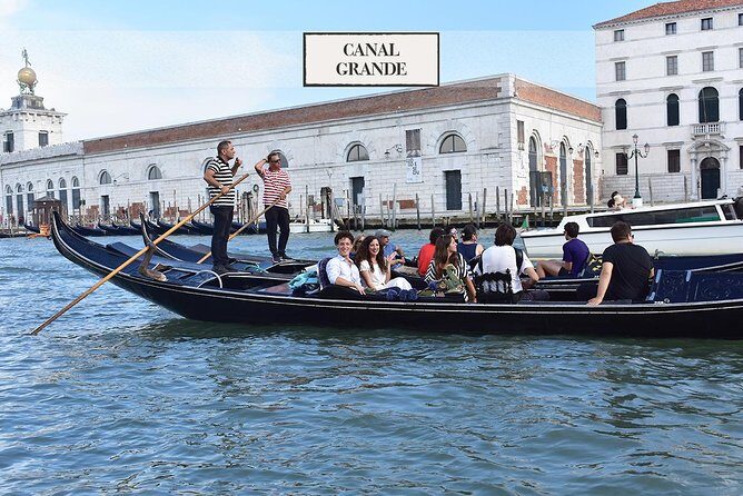 Shared Gondola Ride in Venice through enchanting Bridge of Sighs - Grand Canal highlights: Mozart, Guggenheim, and San Giorgio from the water