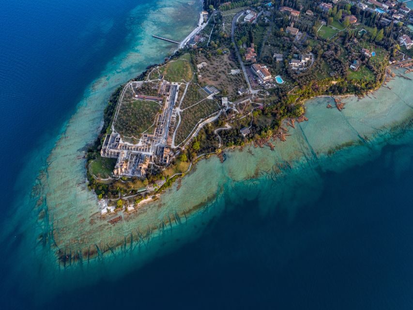 Sirmione: 25 Minute Boat Cruise around the Peninsula - Castle photos and harbor views: the best angles happen early