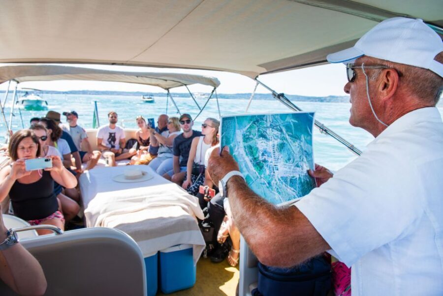 Sirmione: Scenic Afternoon Boat Cruise with Prosecco & Snack - Jamaica Beach, a Private Island Dip, and the Prosecco Rhythm