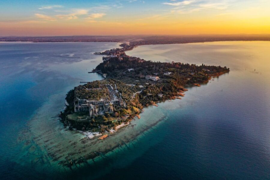 Sirmione: Sunset Boat Cruise with Local Wine - Scaligero Castle From the Water and Under Two Bridges