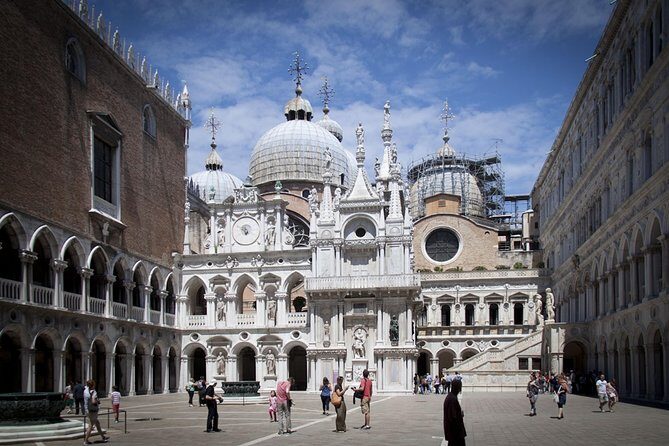 Skip the line Doge's Palace Guided Walking Tour in Venice - Stop 1 at the palace: the courtyard and the Golden Staircase