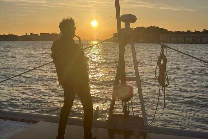 Sunset Jazz Catamaran Cruise with Aperitivo and Live Saxophone - The 90-Minute Canal Loop: San Marco to Giudecca in One Golden Hour