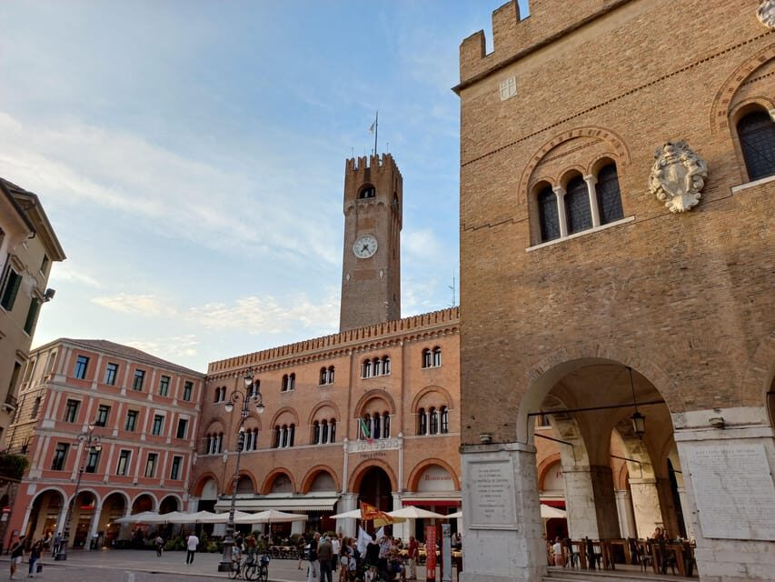 Treviso Small-Group Walking Tour: Top Sights & Hidden Gems - Porta San Tomaso to Isola della Pescheria: walls, water, and old working life