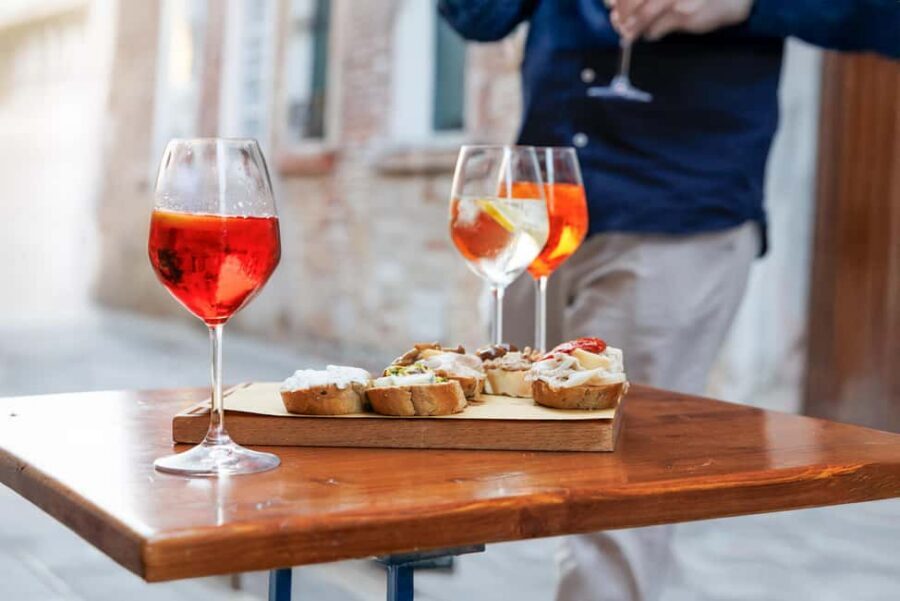Venice Food Tasting Tour: Bites, Wine, Dinner & Local Guide - The Bacaro start: meat cicchetti and a Select Spritz
