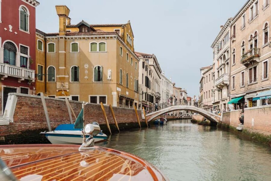 Venice: Grand Canal by Boat with Expert Guide - The boat reality check: luxury speedboat, but conditions can vary