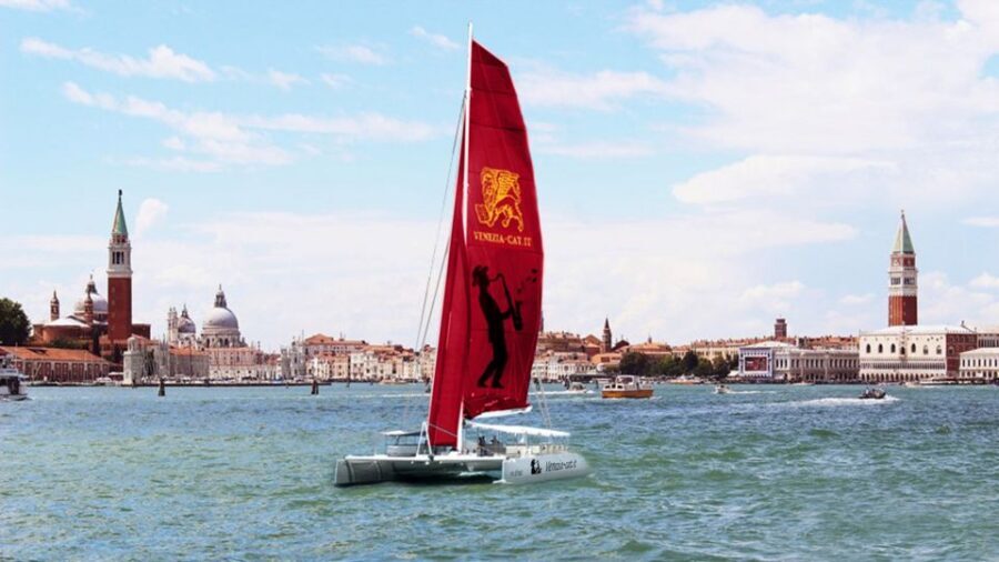 Venice: Lagoon Catamaran Cruise with Music and Drinks - Comfort on a catamaran: roomy deck, seating, and real toilet access