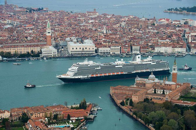 Venice Private Arrival Transfer by Water Taxi: Cruise Port to Central Venice - Boarding the private motorboat: small, direct, and built for luggage