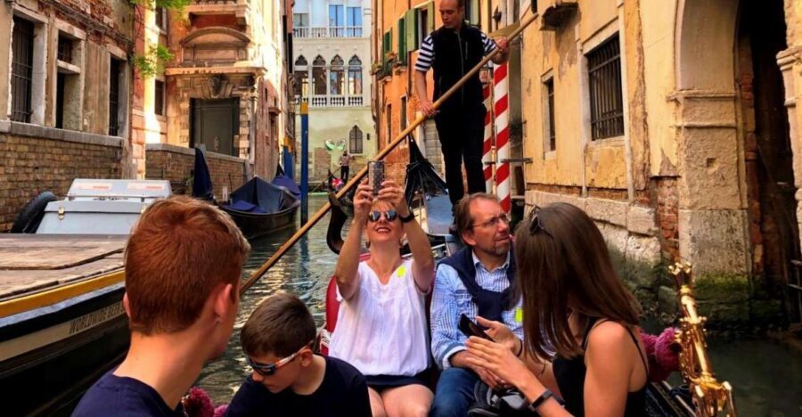 Venice Walking Tour and Gondola Ride Combo - Walking St Mark’s Square to the Doge’s Palace area—then immediately off the main circuit
