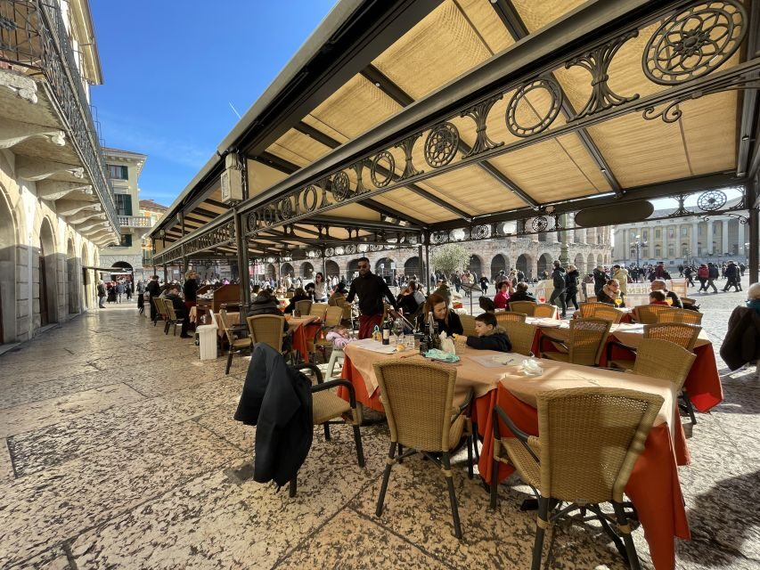 Verona: City Walking Tour with Cable Car & Wine Aperitif - Ponte Pietra and Ponte Scaligero along the Adige: the river as your story line