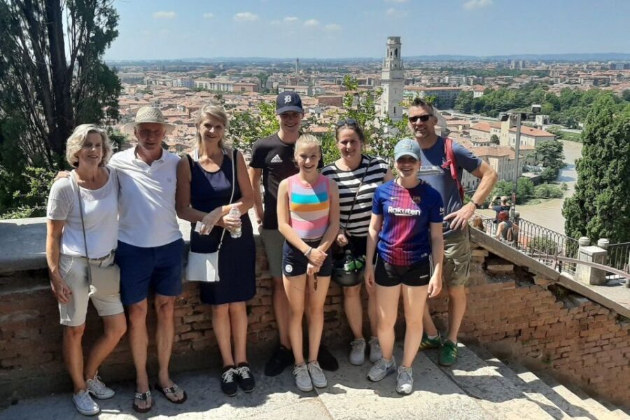 Verona: Highlights and Panorama Bike Tour - Piazza delle Erbe market lanes: the city in motion