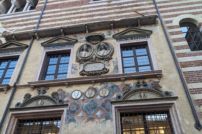 Walking Tour in Verona: 9+ Landmarks with Live Guide - Torre dei Lamberti and the medieval connection near the square